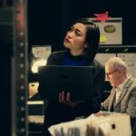 Private investigator organizes archived files for easy access
